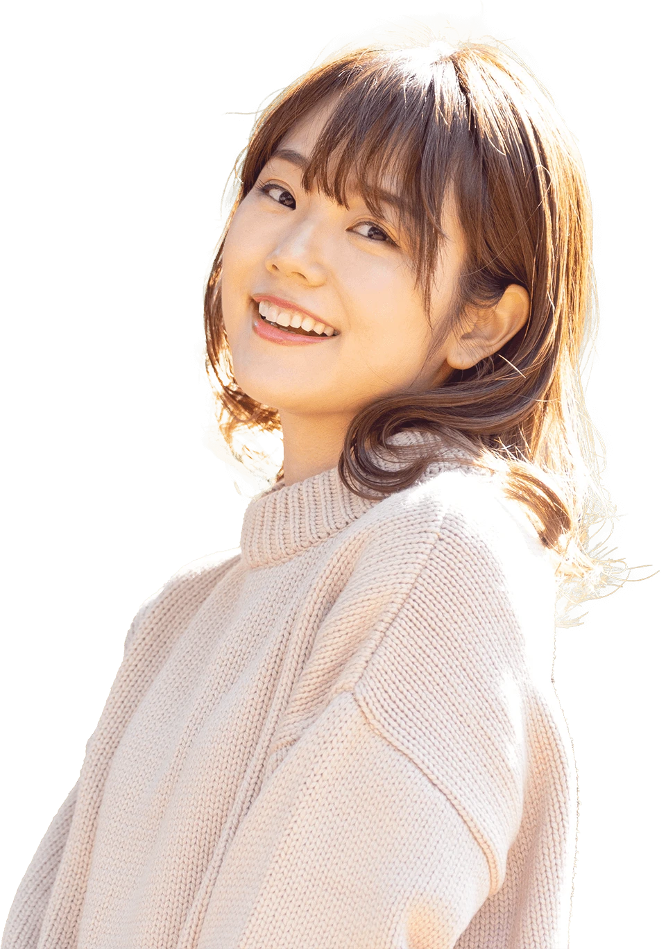 女性が笑顔でこちらを向いている