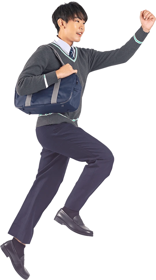 男子学生が喜びながらジャンプしている